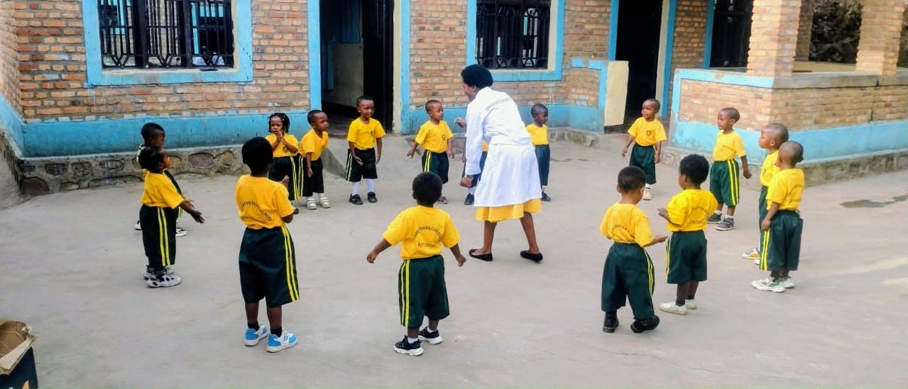 Young learners at Potter's Academy smiling together